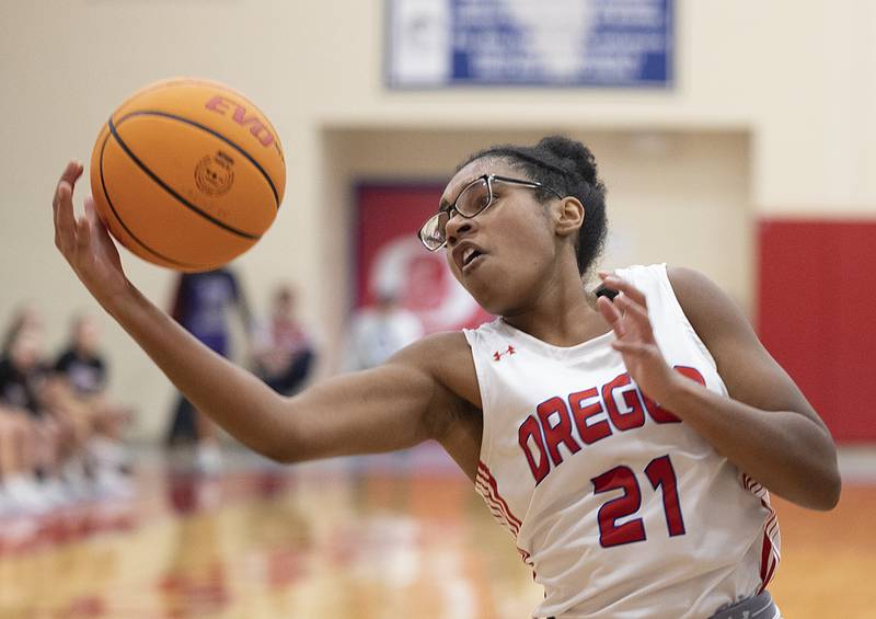 Oregon’s Alease McLain pulls down a rebound against Dixon Thursday, Jan. 16, 2025, at the Blackhawk Center in Oregon.