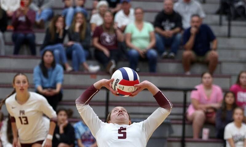 Prairie Ridge’s Grace Jansen passes the ball against Hampshire during varsity volleyball on Thursday, Oct. 3, 2024, at Prairie Ridge High School in Crystal Lake.