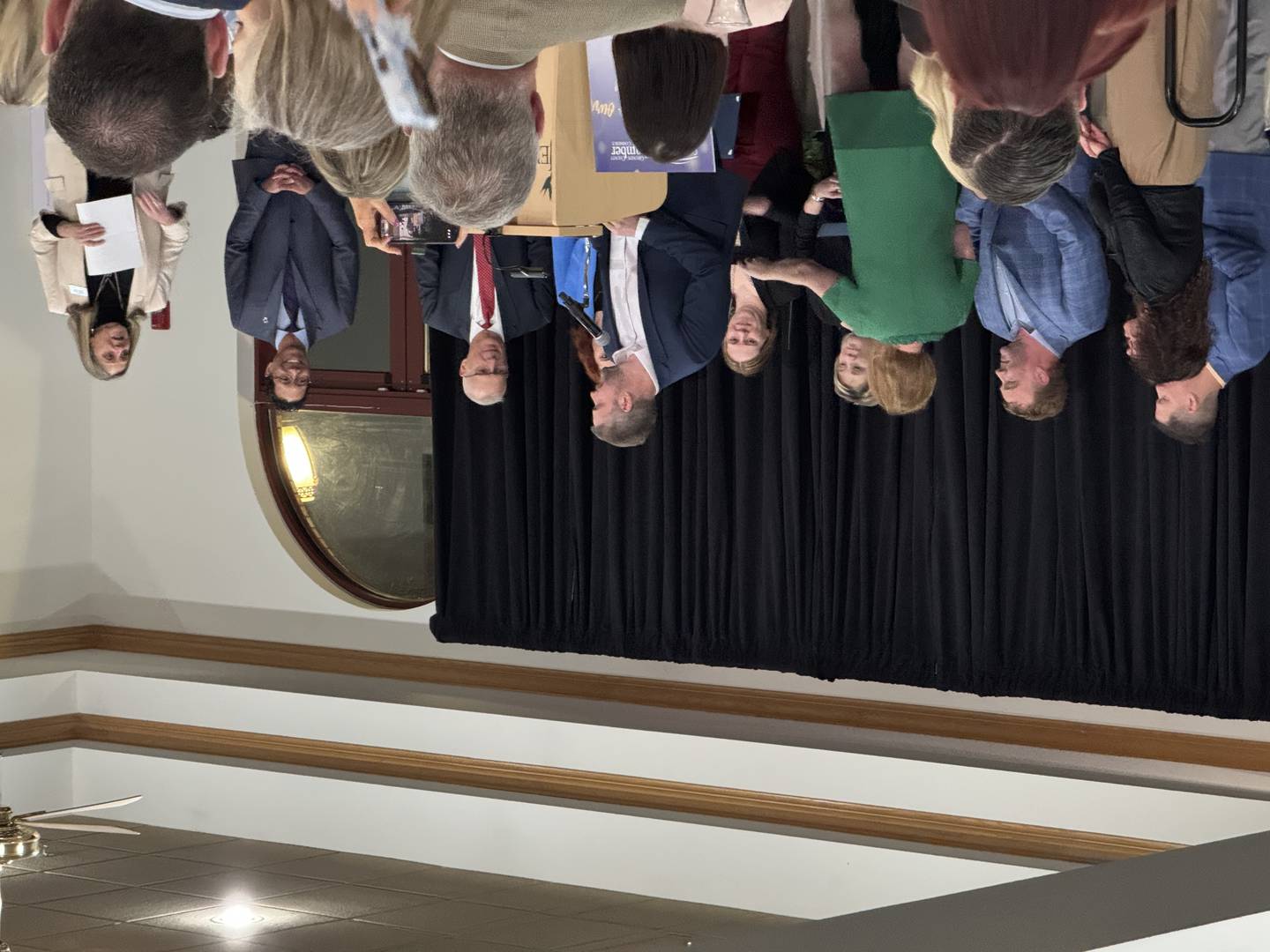 Alec Macdonald, the development director for Grundy County, accepts the Partnership Award on stage with the other members of the Advancing Grundy board. Photo taken on Wednesday, March 5, 2026.