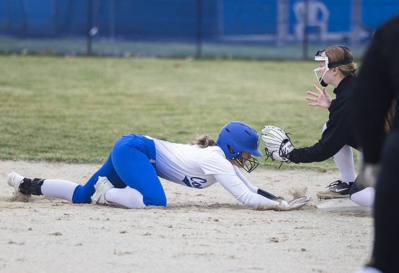 Newman’s Lucy Oetting is tagged out at second against Lena-Winslow Wednesday, April 1, 2026.