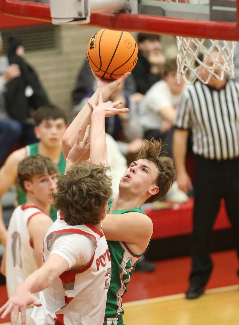 L-P's Jameson Hill lets go of a shot over Morton's Collin Burns during the Class 3A Sectional semifinal game on Tuesday, March 3, 2026 in Kingman Gymnasium at Ottawa High School.