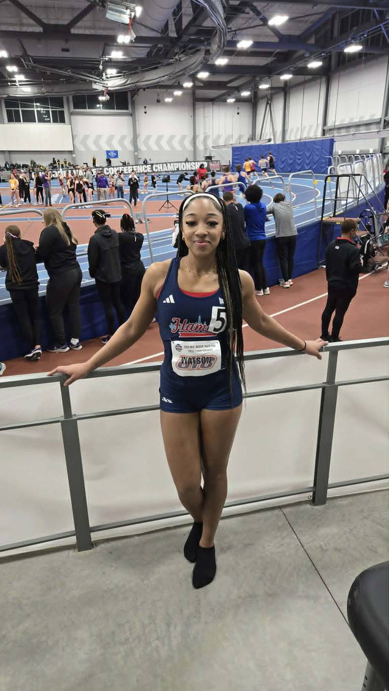 Sariyah Watson, of DeKalb, shows off her UIC Flames track and field jersey in this undated photo. She was a junior sprinter. Watson, 21, was killed on Sunday, May 10, 2026, in a wrong-way crash on Interstate 88 near Aurora.
