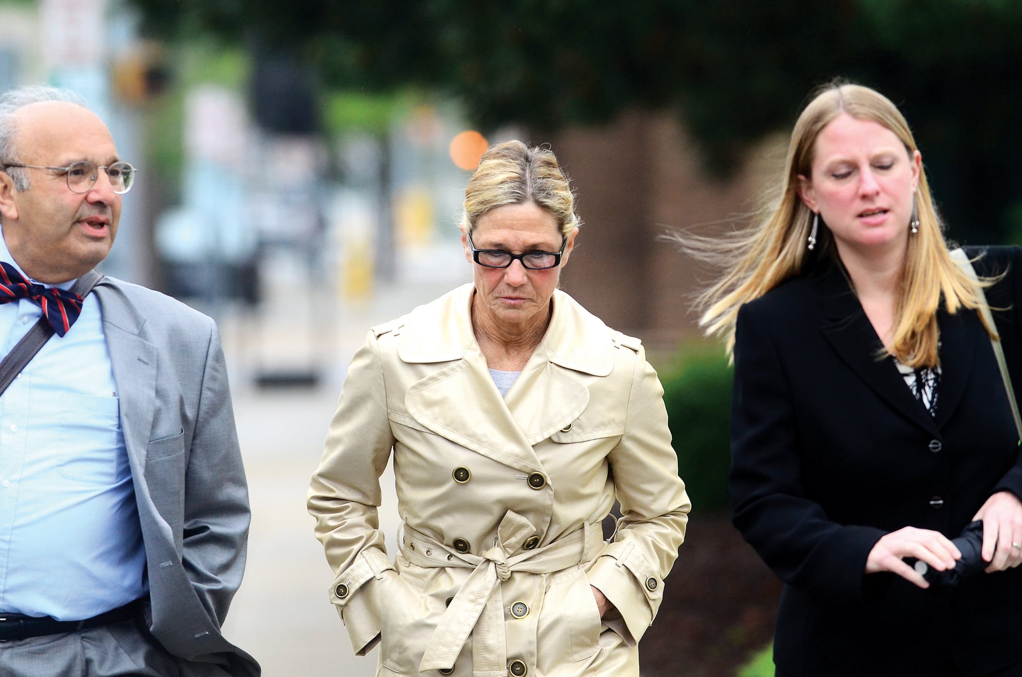 Flanked by her attorneys, Rita Crundwell arrives at Federal Court in Rockford Monday, May 7, 2012 where she pled not guilty to wire fraud.