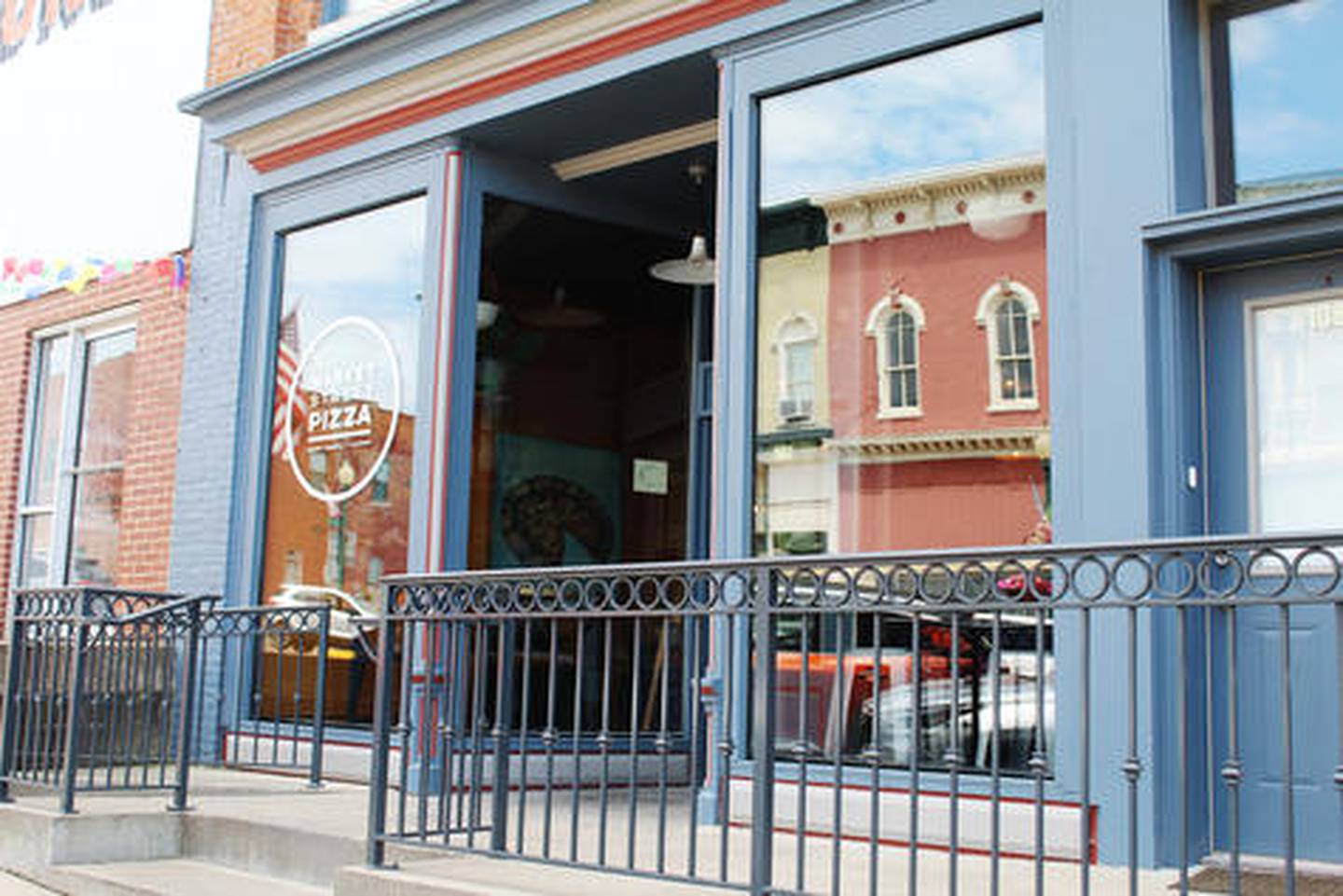 Market Street Pizza is located at 108 W. Market St., Mount Carroll.