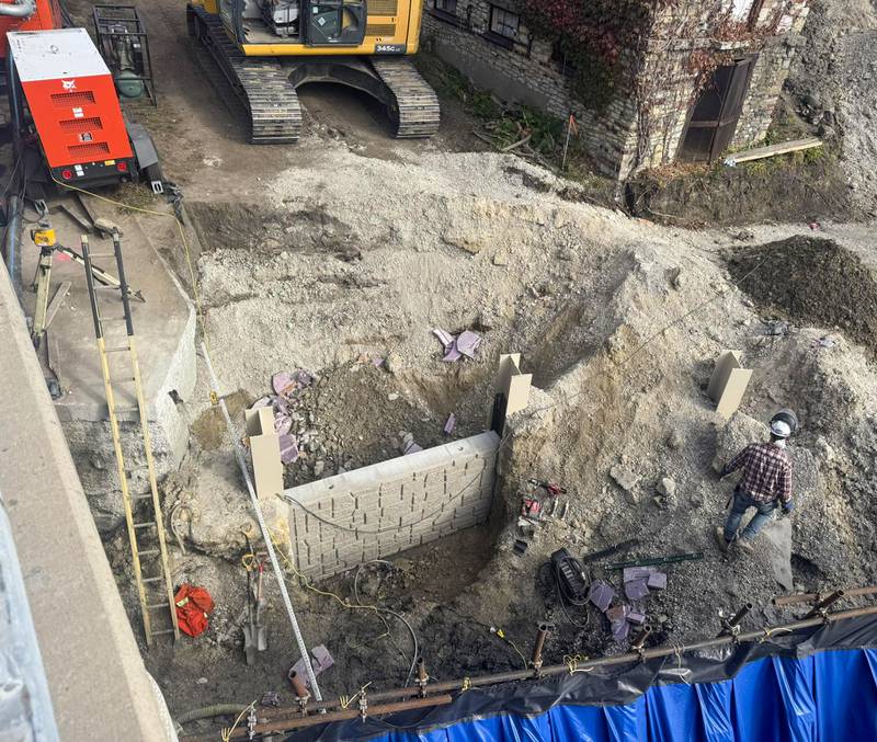 The first sections of the waterfront retaining wall are installed on Nov. 5, 2025, at the East Riverwalk in Kankakee.