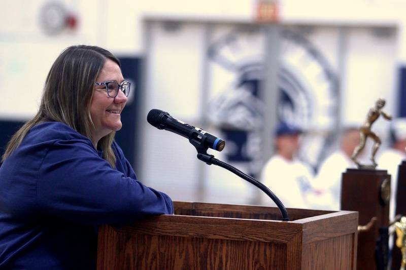 Rebecca Saffert, Principal of Cary-Grove High School, speaks during a celebration of the IHSA Class 6A Champion Cary-Grove football team at the high school Sunday.