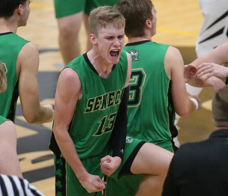 Seneca's Paxton Giertz reacts while running to the sideline after pulling ahead of Putnam County on Friday, Dec. 16, 2022 at Putnam County High School.