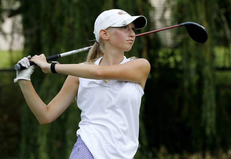 Rylee Rud watches her tee shot on the sixth hole during the final round of McHenry County Junior Amateur Golf Tournament  on Tuesday, July 18, 2025, at Foxford Hills Golf Club in Cary.