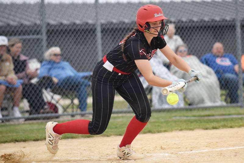 Bradley-Bourbonnais' Liv Woolman bunts the ball during the Class 4A Normal Community Regional championship against Normal Community Friday, May 22, 2026.