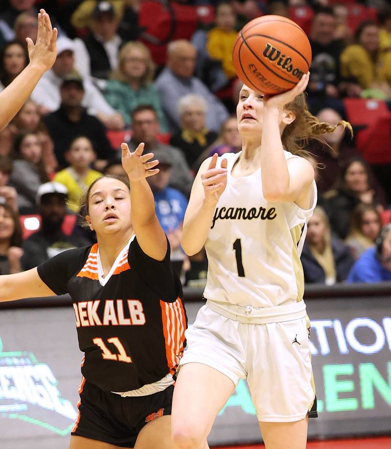 Sycamore's Mallory Armstrong shoots in front of DeKalb's Ari Smith during the First National Challenge Friday, Jan. 27, 2023, at The Convocation Center on the campus of Northern Illinois University in DeKalb.