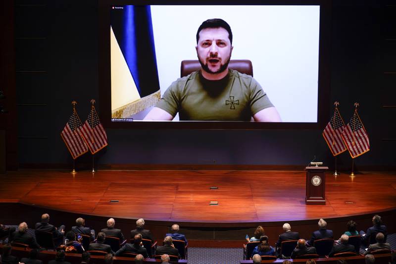 Ukrainian President Volodymyr Zelenskyy speaks to the U.S. Congress by video to plead for support as his country is besieged by Russian forces, at the Capitol in Washington, Wednesday, March 16, 2022.
