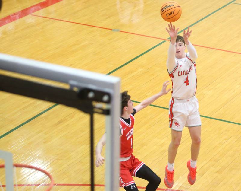 L-P's John Sowers lets go of a shot over Ottawa's Colt Bryson during the Class 3A Regional title game on Wednesday, Feb. 25, 2026 in Sellett Gymnasium at L-P High School.