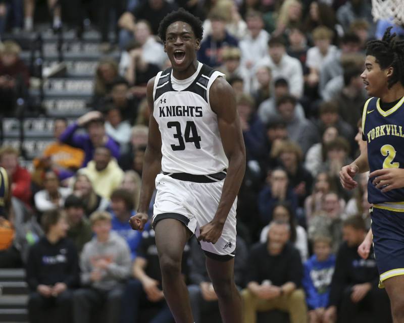 Kaneland's Jeffrey Hassan (34) reacts after dunking during their Plano Christmas Classic Championship basketball game between Yorkville Christian at Kaneland Tuesday, Dec 30, 2025 in Plano.
