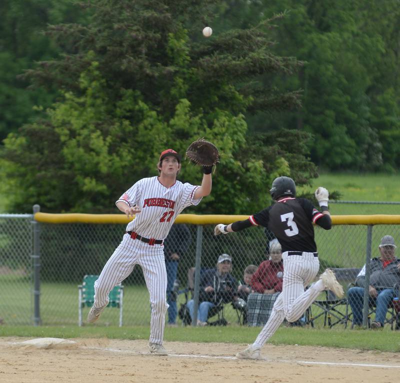 Fulton's Jacob Voss reaches first base safely as Forreston first baseman Alec Schoonhoven tries to catch the high throw during first inning action at the 1A Amboy Regional on Saturday, May 24, 2025. The Steamers scored six runs in the first inning en route to a 7-4 win over Forreston.