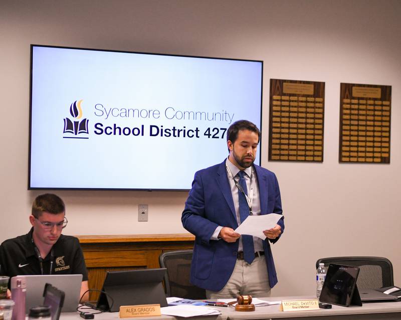 Sycamore school board president Michael DeVito II addresses the community on Friday Aug. 1, 2025, during a school board meeting that superintendent Steve Wilderhas been removed from his position held at the administration office in Sycamore.