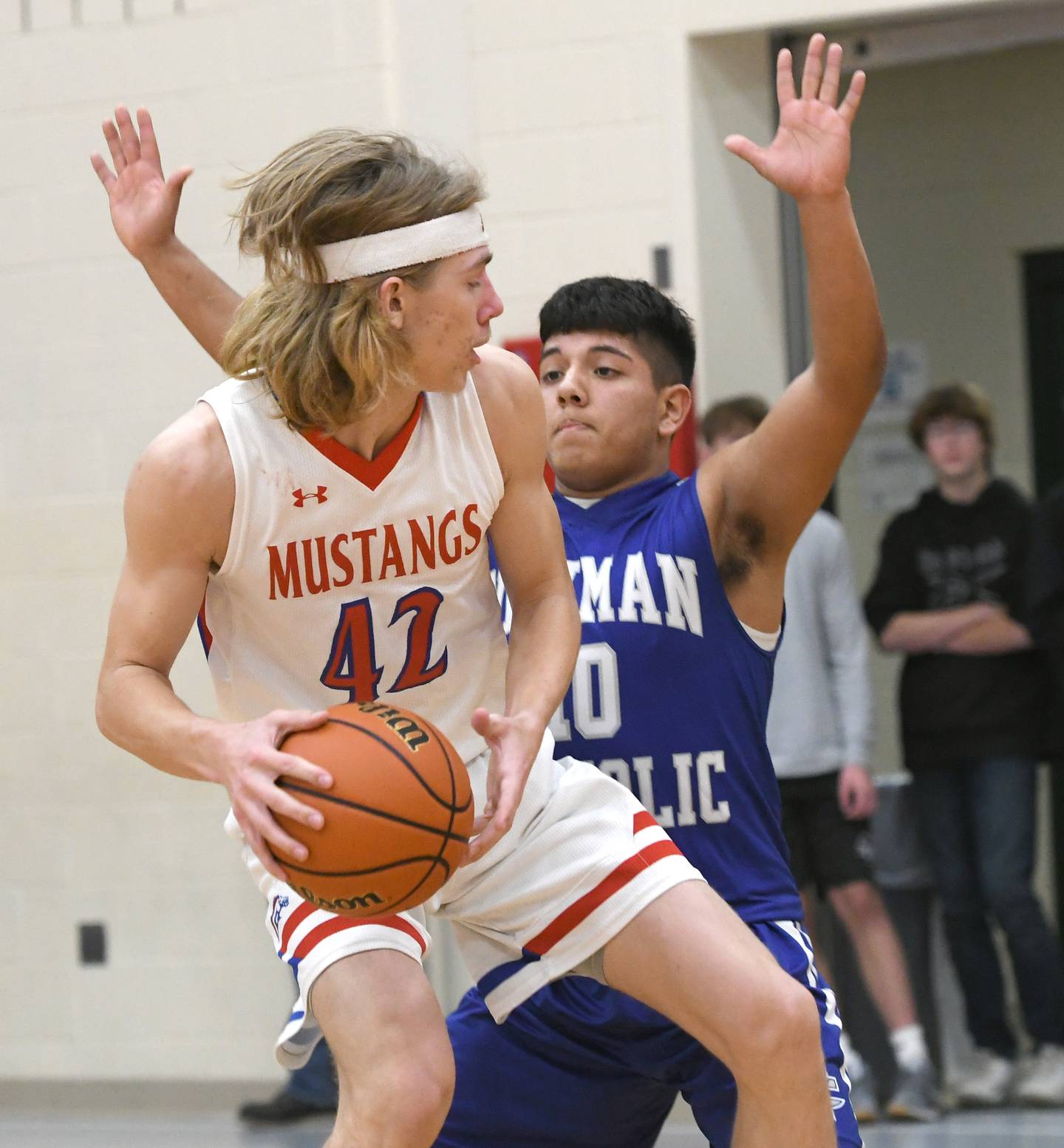 Newman's Gabe Padilla guards Morrison's Brenden Martin during afternoon action at the Oregon Thanksgiving Tournament on Saturday, Nov. 26.