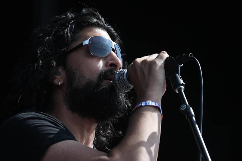 Lucky Boys Confusion, hailing from DuPage County, lead singer Kaustubh "Stubhy" Pandav performs on the Roots stage on day one of Riot Fest. Friday, Sept. 17, 2022, in Chicago.