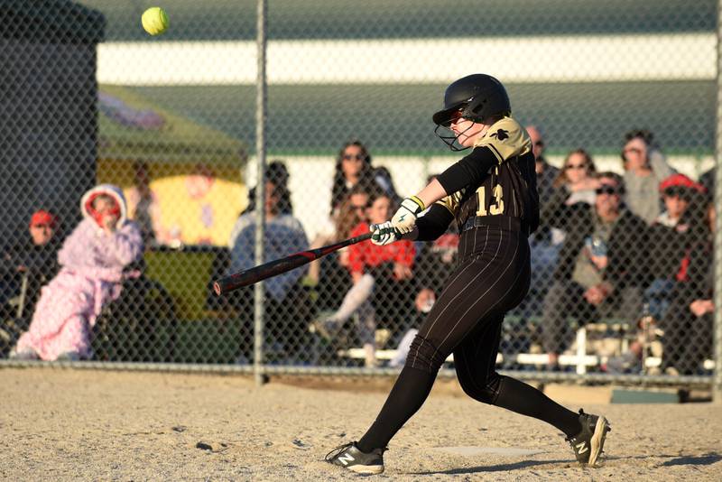 Bishop McNamara's Emma Thyfault hits a pitch during a home game against Bradley-Bourbonnais Thursday, May 7, 2026.