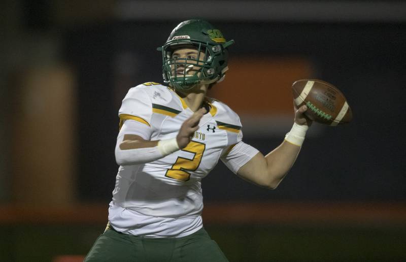 Crystal Lakes South's Justin Kowalak looks to pass the ball against Harlem High School at Harlem High School on Saturday, Oct. 30, 2021, in Machesney Park.
