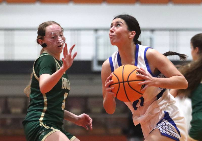 Boylan’s  Zoey Schmidt, left, guards Geneva’s Ella Wilkison in girls IHSA Class 3A Sectional basketball on Tuesday, Feb. 24, 2026, at Crystal Lake Central High School in Crystal Lake.