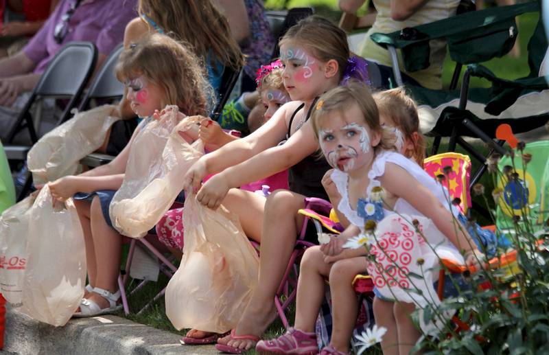 Youngsters anxiously await the start of the Frankfort Fall Festival Parade on Sunday. The festival continued Monday.