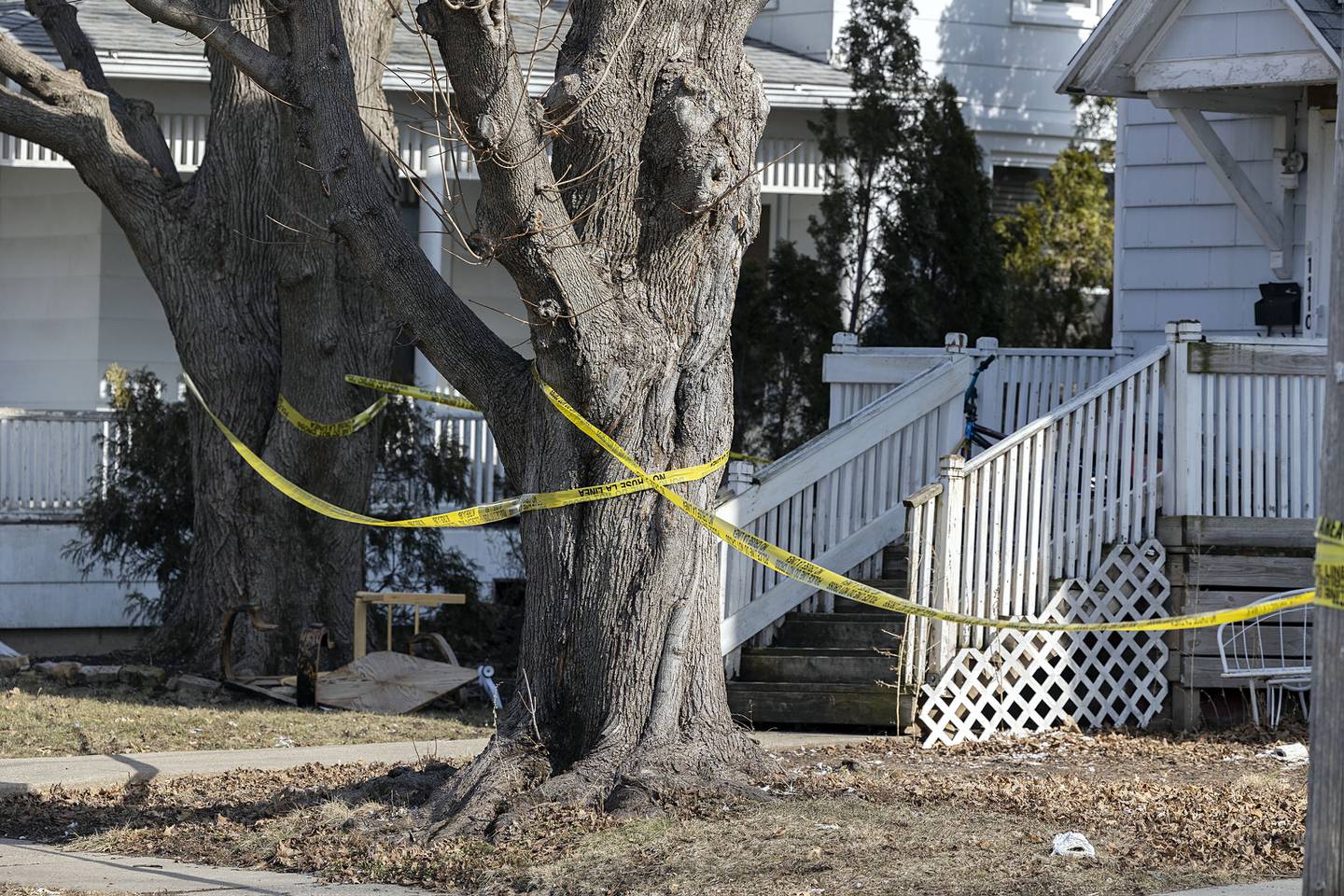 Investigators work at the scene Monday, Feb. 20, 2023 of a Sunday night shooting in the 1100 block of 4th Ave. in Sterling. One victim was pronounced dead with four taken into custody.