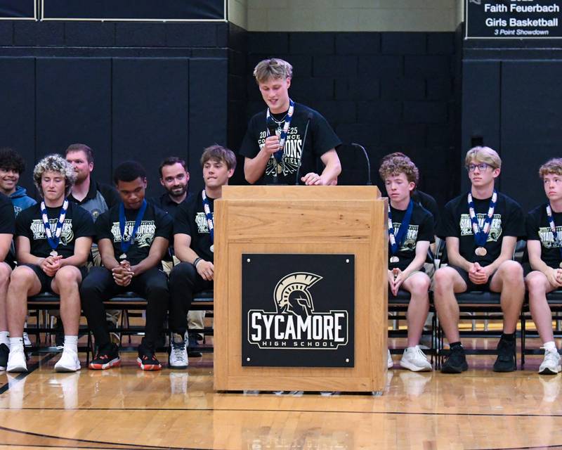 Sycamore’s Aidan Wyzard who placed in the 200-meter dash, 100-meter dash as well as the long jump at the IHSA meet speaks during the pep rally on Tuesday June 4, 2025, at Sycamore High School after the team brought back the championship trophy.