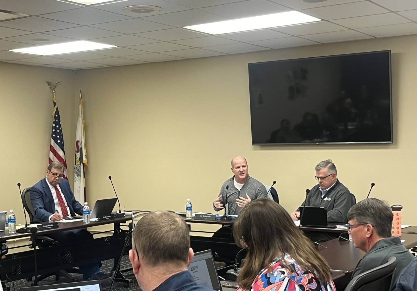 Crystal Lake Park District Board President Eric Anderson (middle) speaks in opposition to keep park police department at a meeting Feb. 15, 2024.