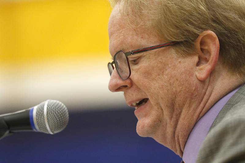 Pronouncer Paul Lockwood defines a word to a contestant during the McHenry County Regional Office of Education’s 2025 Spelling Bee on Wednesday, March 19, 2025, at Bernotas Middle School in Crystal Lake.
