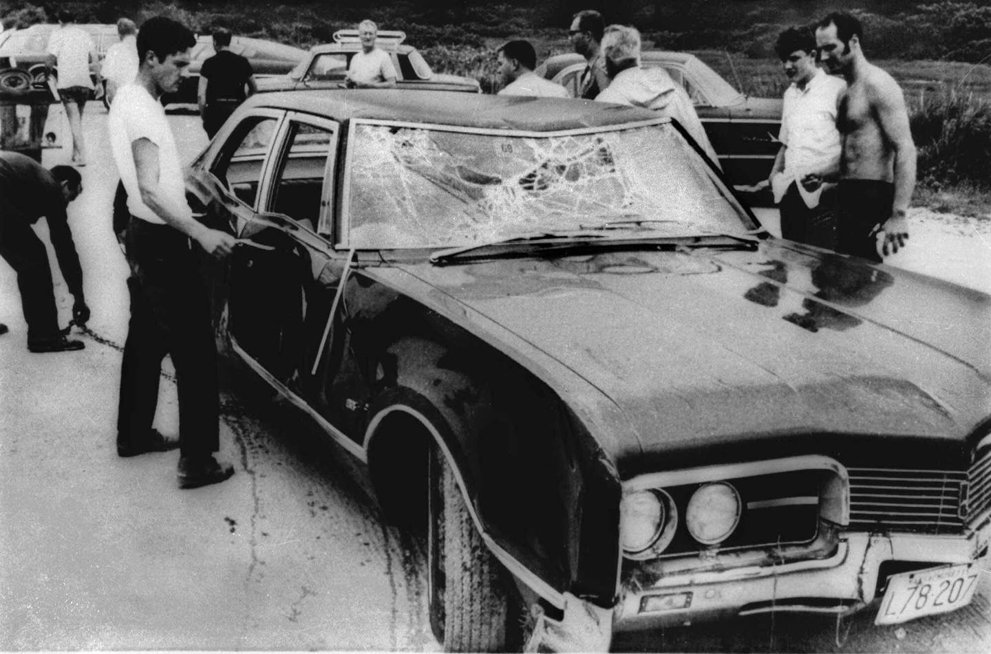 This July 19, 1969, file photo shows the wreckage of U.S. Sen. Edward Kennedy's car after being pulled from the water next to the Dike Bridge on Chappaquiddick Island in Edgartown, Mass., on Martha's Vineyard. Mary Jo Kopechne, a passenger, was trapped in the car and died after Kennedy drove it off the bridge in July 1969.