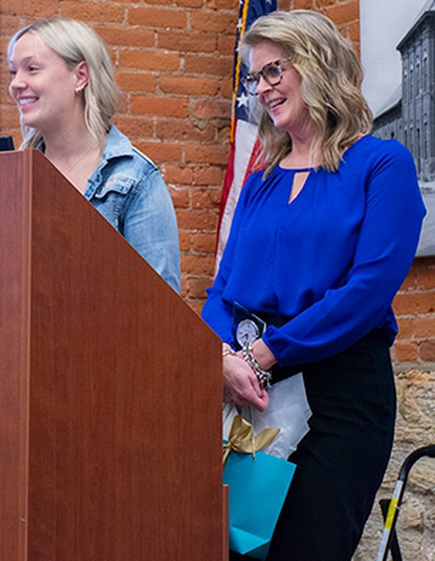 (Left to right); Sandwich High School student Londyn Scott recognizing Julie Thompson during the 2025 Excellence in Education Awards Ceremony