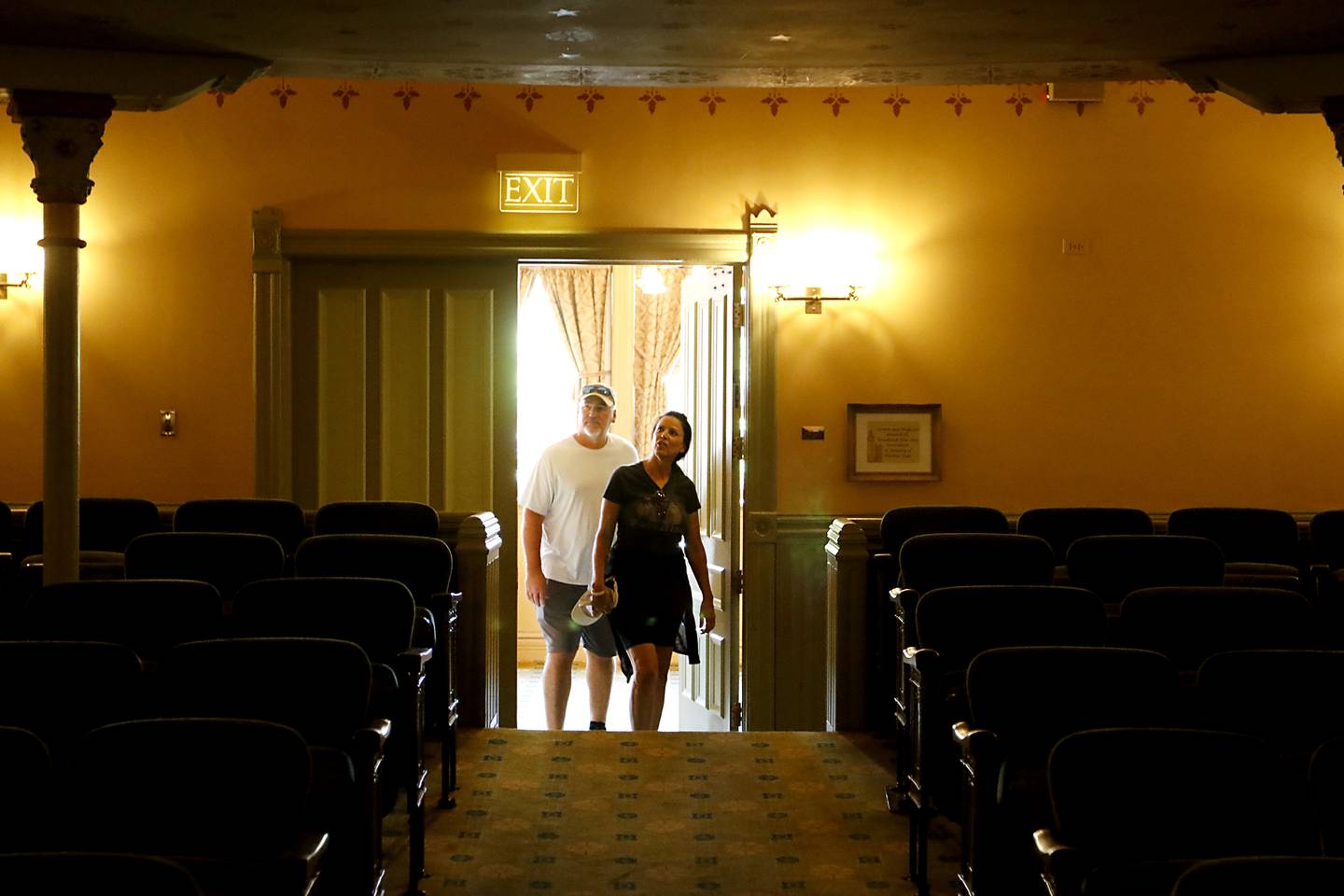 Jeffery and Patricia Werth of Orlando, Florida, tour the Woodstock Opera House Wednesday, Sept. 7, 2022, while visiting family in the area. Woodstock has come into millions of dollars thanks to both a state grant and money it won last year as part of the T-Mobile contest. As a result, the city is undertaking a variety of projects around town, predominantly in the downtown area.