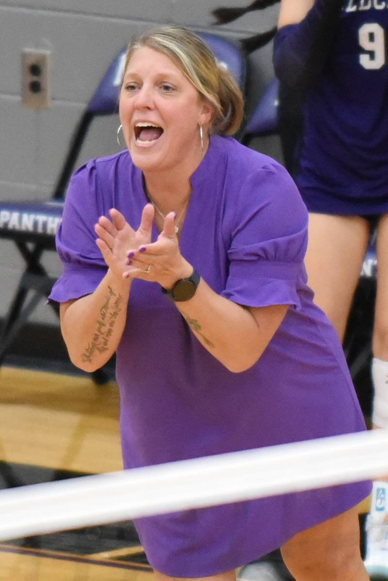 Wilmington girls volleyball coach Kelly Van Duyne applauds a Wildcats point during their win at Manteno Tuesday, Oct. 7, 2025.