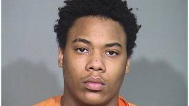 Woodstock man, 18, accused of Snapchat gun threats while on pretrial release in alleged Walmart beating