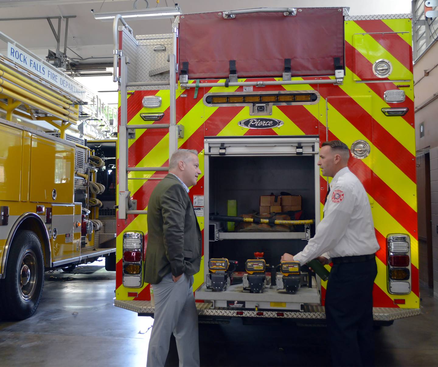 Rock Falls Deputy Fire Chief Kyle Sommers (right) gives U.S. Rep. Eric Sorensen, D-Rockford (left) a tour of the Rock Falls firehouse on Friday, Aug. 9, 2024. Sorensen met with Rock Falls and Sterling fire department leaders regarding his request to Congress for $1.5 million in federal funding to help the departments build a new fire training center.