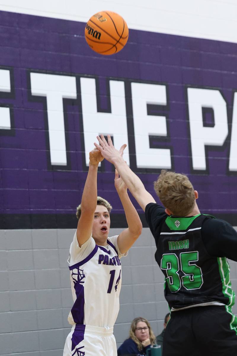 Manteno's Dylan Polito shoots under pressure from Bishop McNamara's Richard Darr during the Fightin' Irish's 61-24 victory over Manteno on Tuesday, Jan. 13, 2026.
