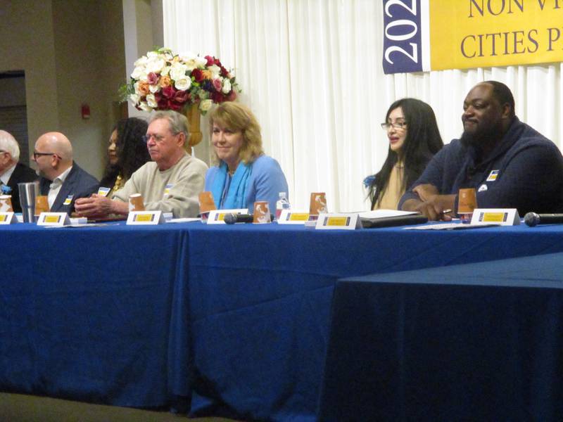 Joliet City Council candidates gather before the start of the forum sponsored by the Nonviolent Cities Project-Joliet on Wednesday, March 15, 2023.