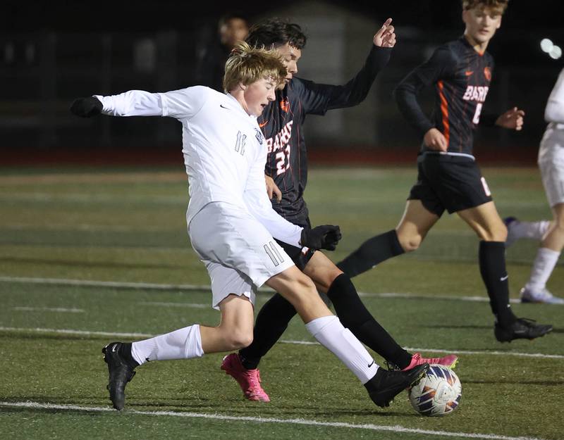 Kaneland's Matthew Mitchinson and DeKalb’s Diego Rivas meet at the ball during their game Thursday, Oct. 12, 2023, at DeKalb High School.