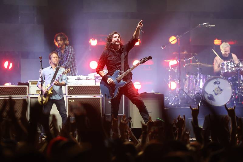 Foo Fighters Dave Grohl points to the crowd on the Riot Stage on day one of Riot Fest, Friday, Sept. 15, in Chicago.
