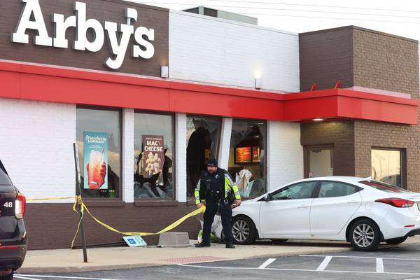 Photos: Car strikes Arbys in Peru