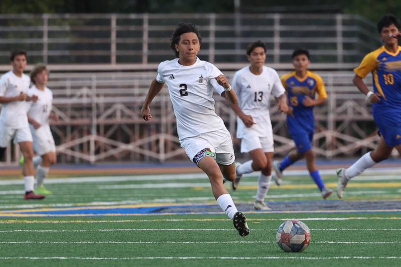 Joliet Catholic’s William Powers runs down the ball against Joliet Central on Monday, Sept. 9, 2024 in Joliet.