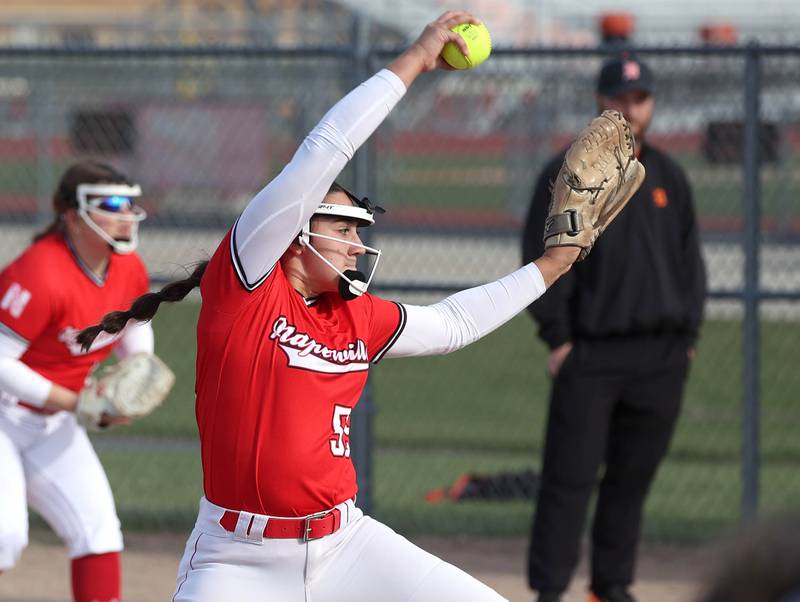 Naperville Central's Avery Miller delivers a pitch Wednesday, April 16, 2025, during their game against at DeKalb High School.