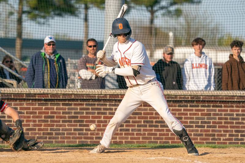Oswego’s Tyler Stack (25) takes a pitch for a ball during a baseball game against Minooka at Oswego High School on Tuesday, April 18, 2023.