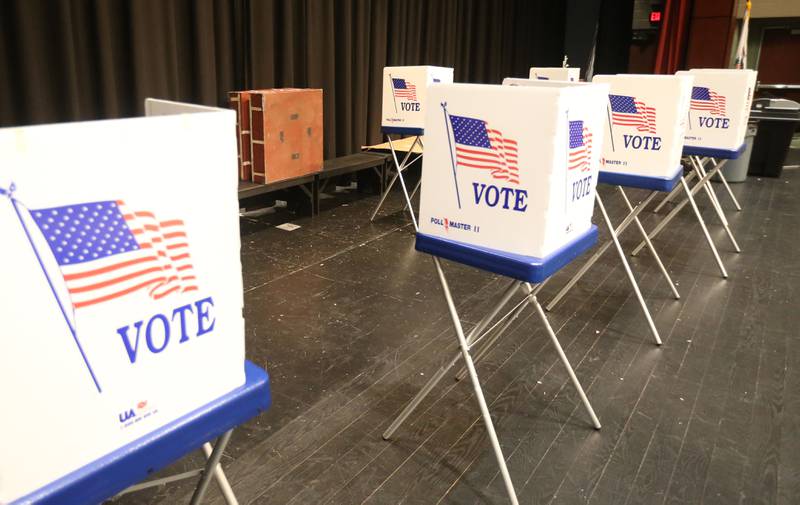 Empty voting booths are vacant on Tuesday, March 17, 2026 at Hall High School in Spring Valley.