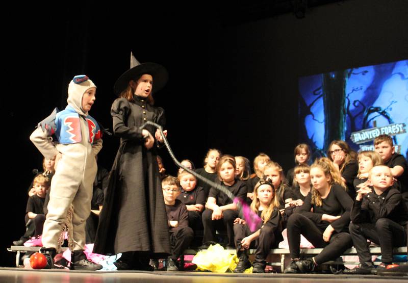 Nikko (Rylee Oakmann), the commander of the flying monkeys, and the Wicked Witch of the West (Alexandria Pedelty) are indignant at the heroes' lack of cooperation Friday, March 22, 2024, during the Streator Elementary Schools production of "The Wizard of Oz – Youth Edition" at Streator High School.