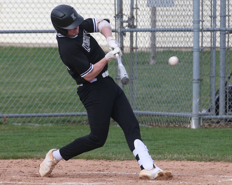 Kaneland's Patrick Collins hits the ball to left field against L-P on Wednesday, April 5, 2023 at Dickinson Field in Oglesby.