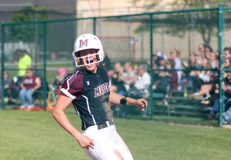 Marengo’s Kylee Jensen celebrates after coming around to score against Aurora Central Catholic in IHSA Class 2A Regional Title Game action softball at Marengo High School in Marengo on Friday, May 23, 2025.
