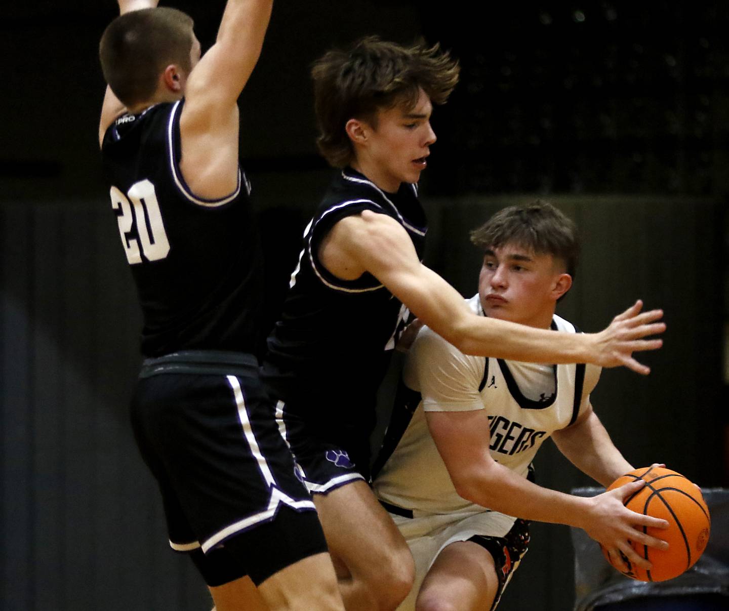 Hampshire's Ryan Prowicz (left) and Hampshire's Eli Schol (center) pressure Crystal Lake Central's Carter Kelley, (right) during a a Fox Valley Conference basketball game on Friday, Feb. 7, 2025, at Crystal Lake Central High School.
