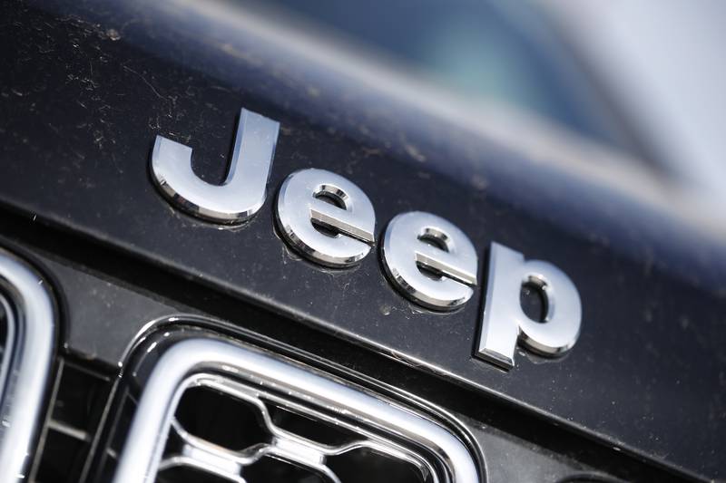 FILE - This April 15, 2018 photo shows the Jeep logo in the south Denver suburb of Englewood, Colo.  Chrysler is recalling more than 330,00 Jeep Grand Cherokees, Wednesday, Feb. 28, 2024,  because of a steering wheel issue that may cause drivers to lose control of their vehicles. The recall is for 338,238 of Chrysler’s 2021-2023 Jeep Grand Cherokee L and 2022-2023 Jeep Grand Cherokee vehicles. (AP Photo/David Zalubowski)