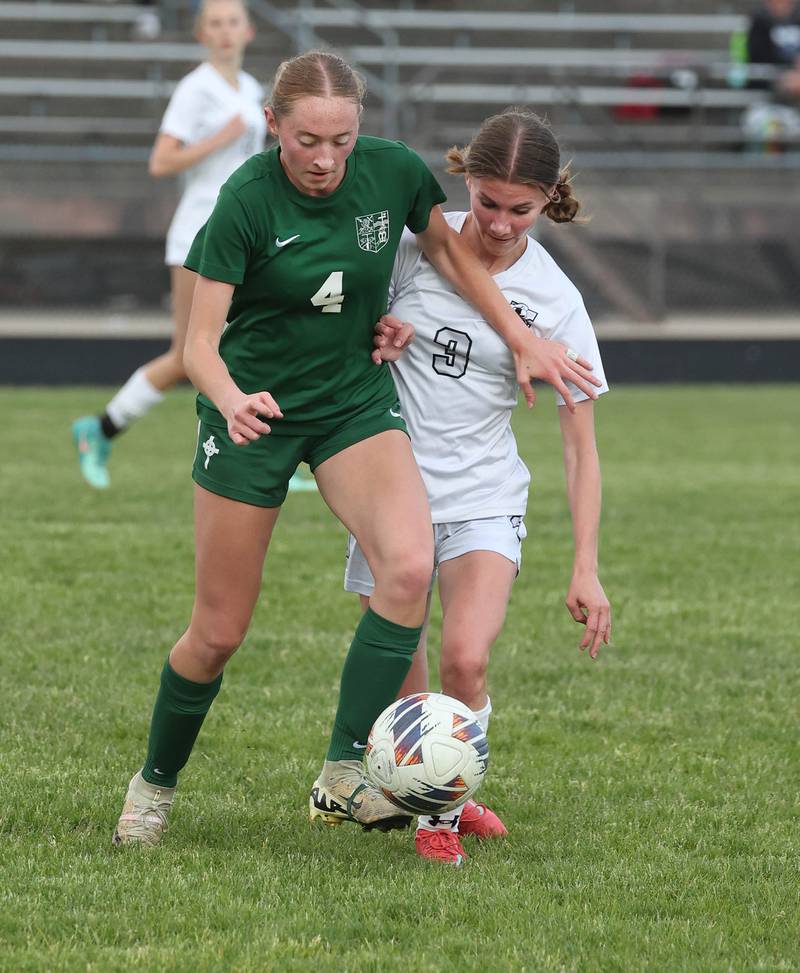 Kaneland's Zoe Gannon (right) and Boylan's Zoey Schmidt fight for possession Wednesday, May 28, 2025, during their Class 2A sectional semifinal game at Belvidere High School.